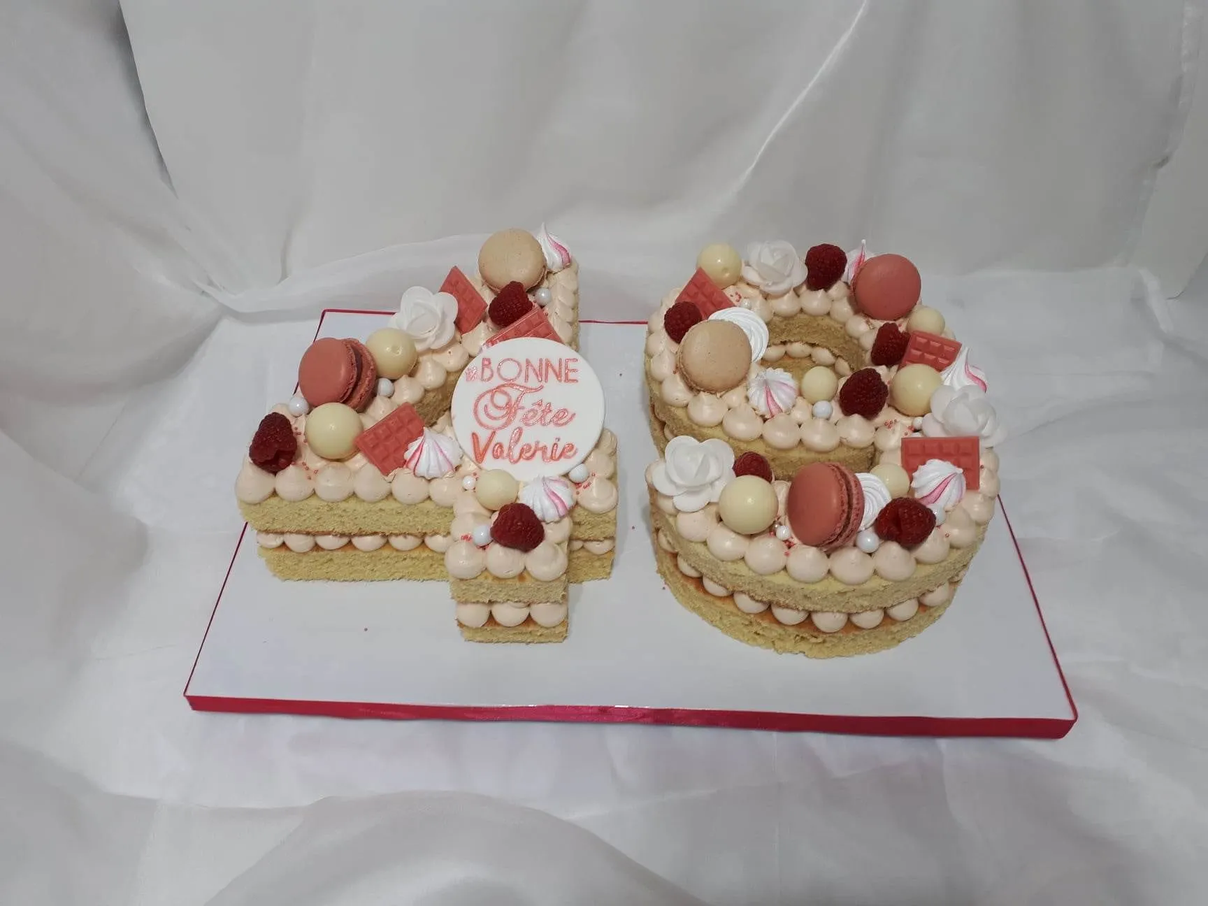 Number 49 cake with macarons and flowers